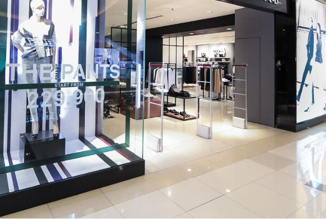 A Delamibrands store front and window display